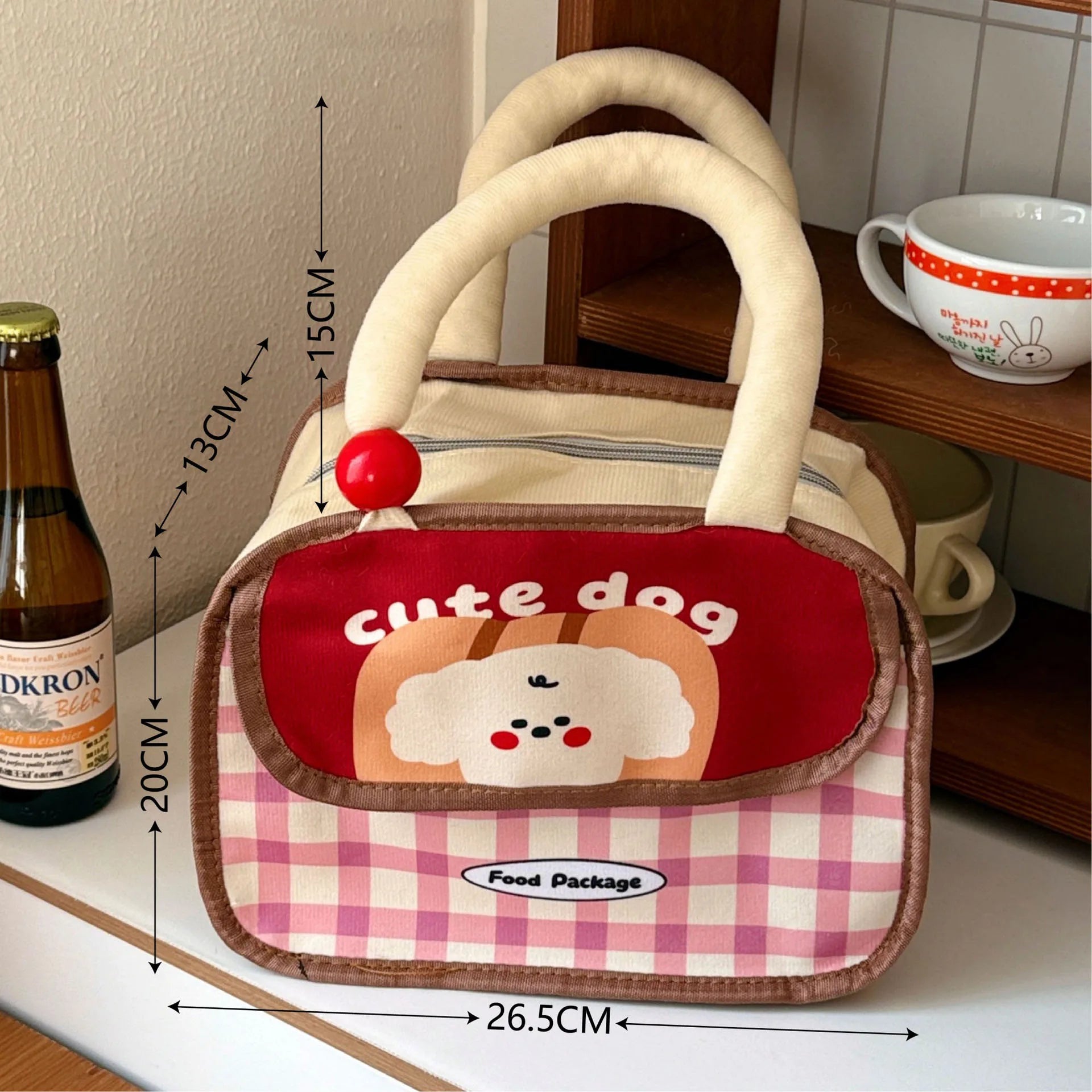 Small kawaii bag with cartoon dog design and measurements on a surface