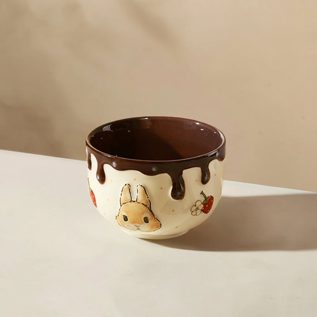 Ceramic kawaii ramen bowl with cartoon design and measurements on a beige background