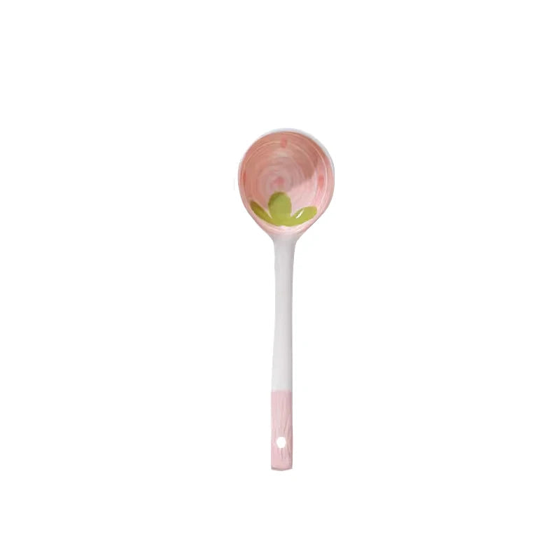 A kawaii spoon designed with a strawberry on a white background