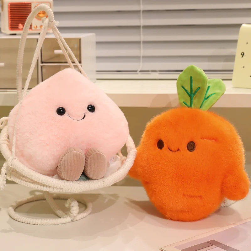 Two kawaii plush toys, one pink and one orange, resembling a pear and a carrot, respectively, on a surface.