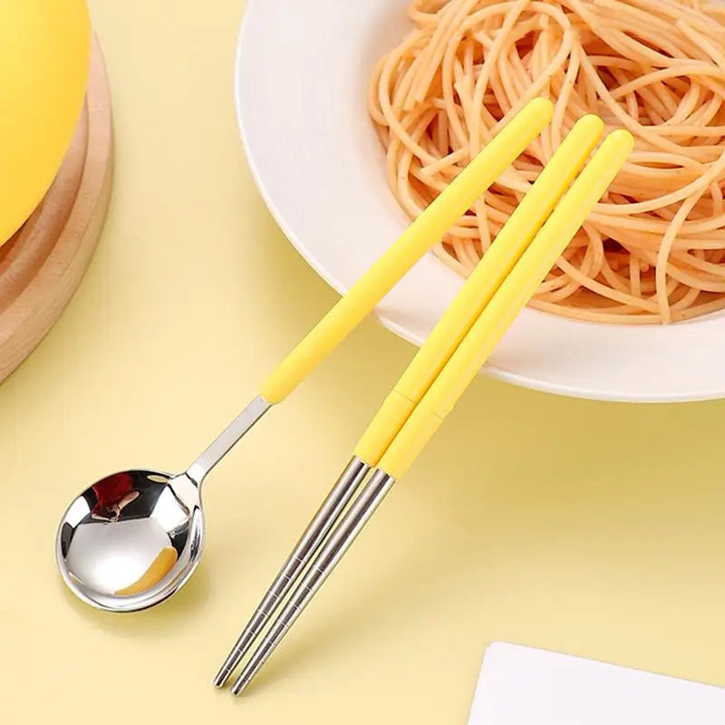 Yellow kawaii utensils on a yellow background