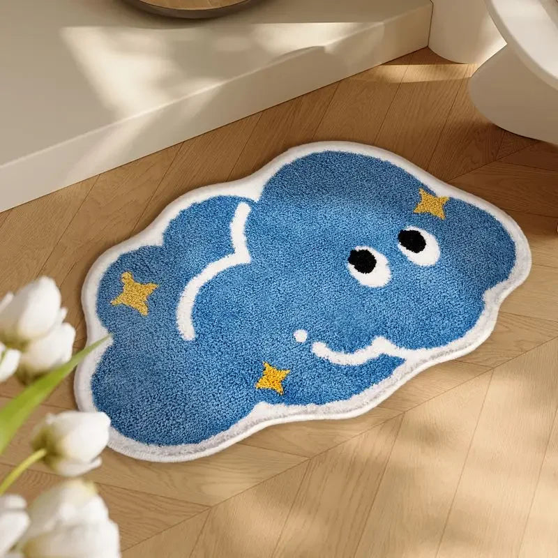 Blue cloud-shaped kawaii rug with facial features on a wooden floor