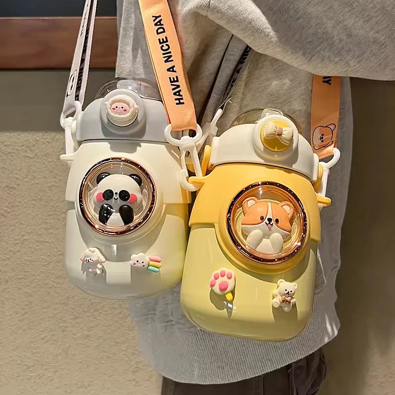 Two cartoon-themed kawaii water bottles with animal designs on a neutral background