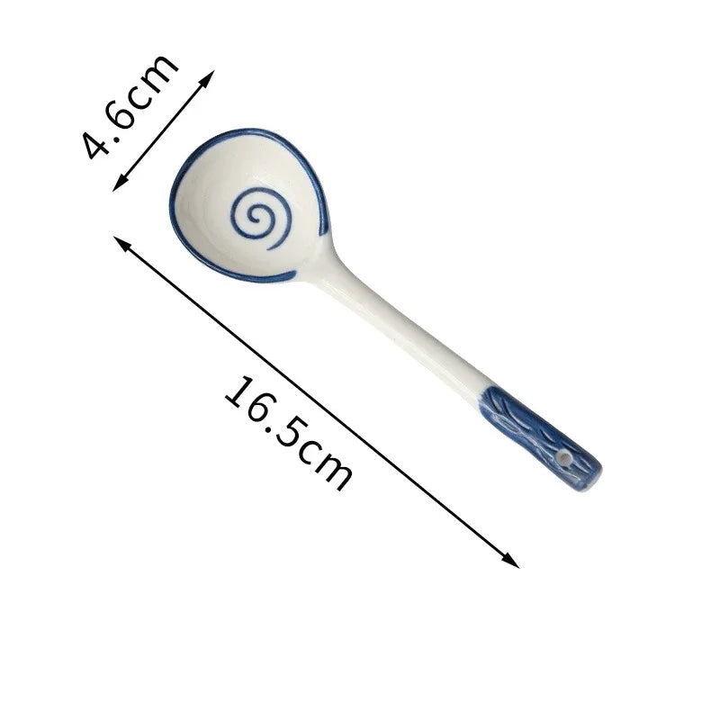 A blue and white kawaii spoon on a white background
