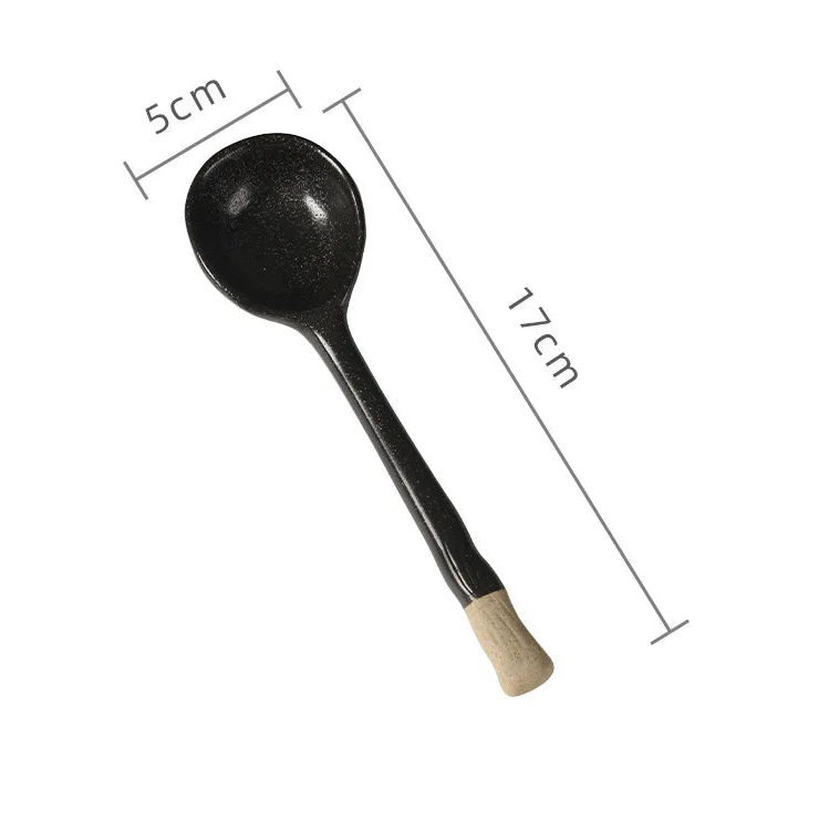A black kawaii spoon with measurements
