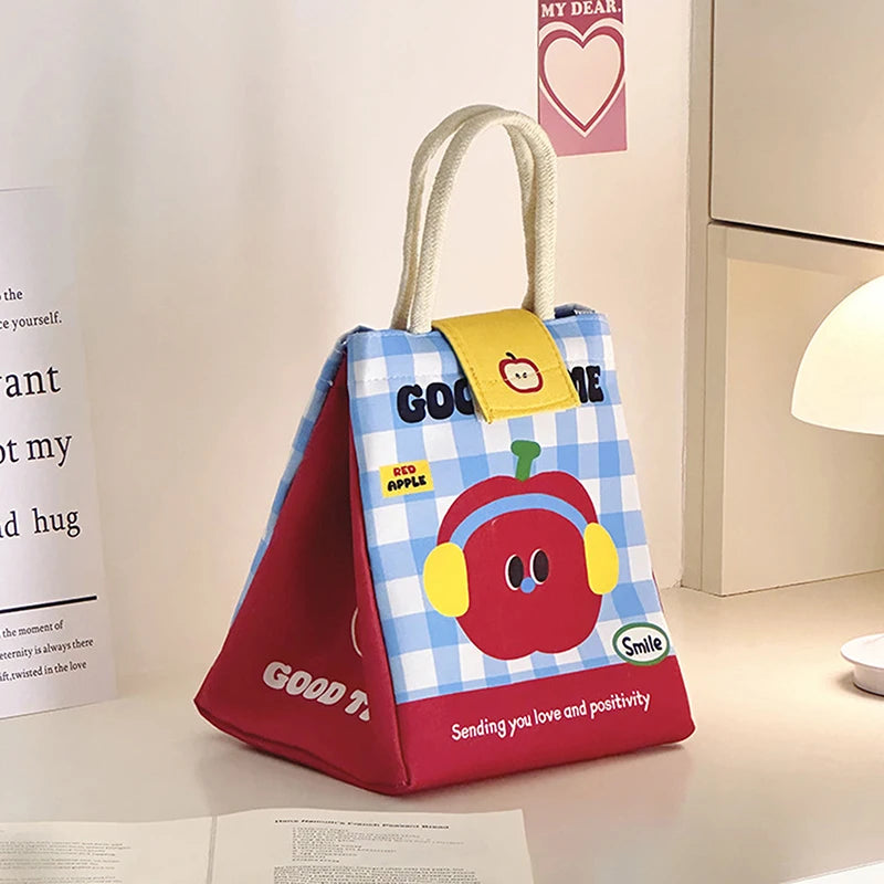 Children's kawaii tote bag with cartoon apple design on a light background