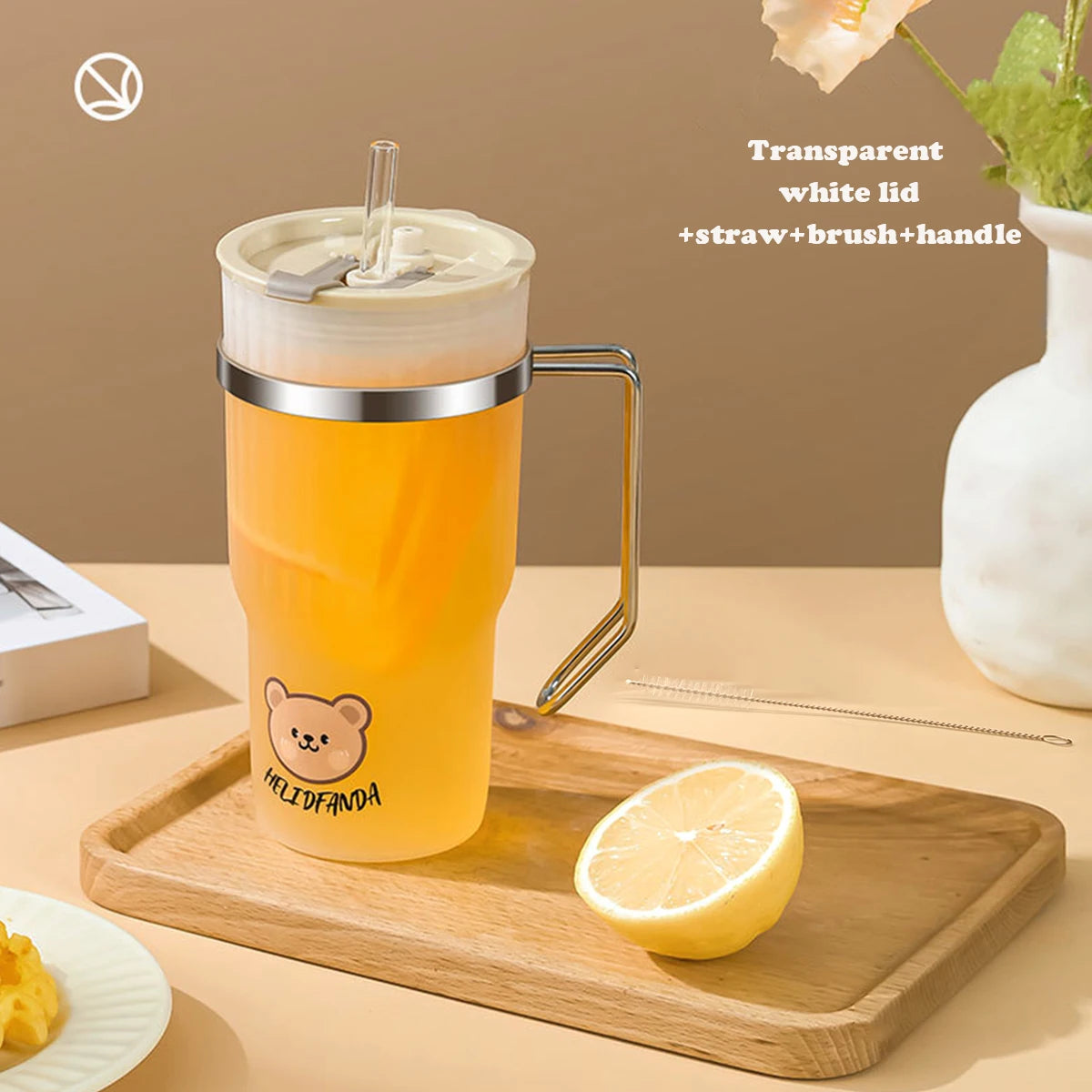Clear white lid with straw and handle on a kawaii water cup of orange juice on a wooden tray.