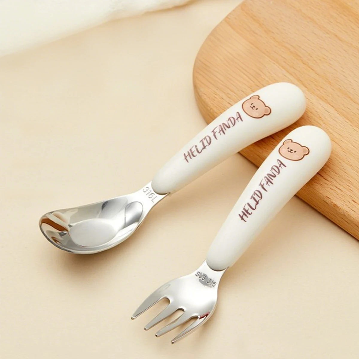 A pair of kawaii utensils with a teddy design