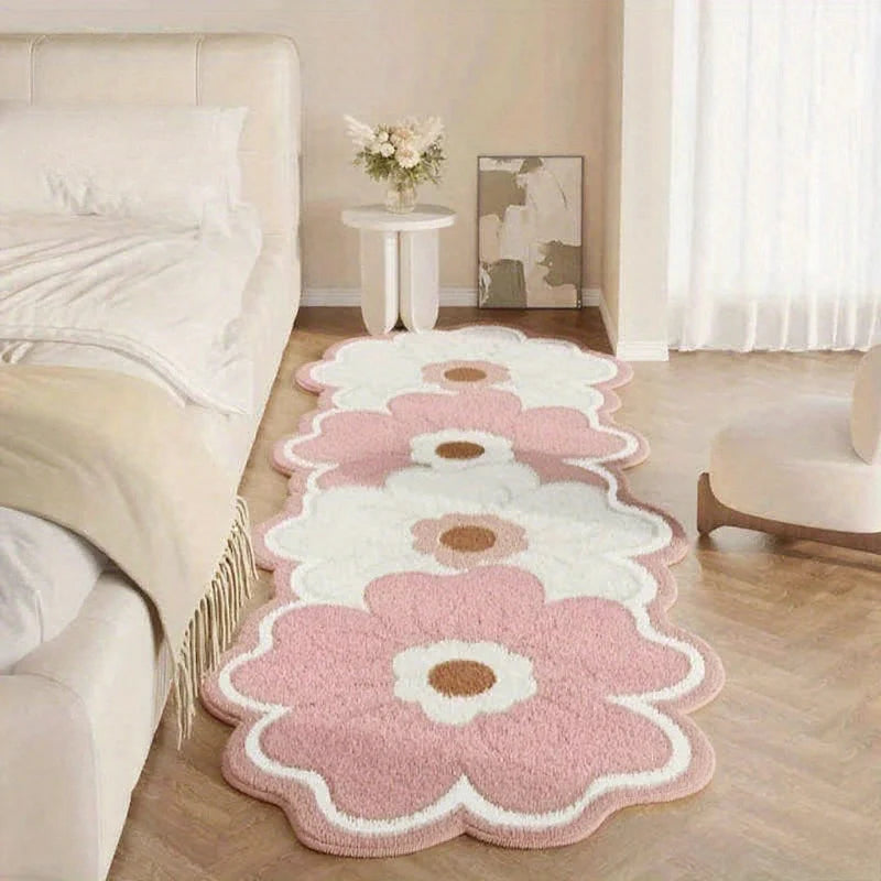 Floral patterned kawaii rug on a wooden floor in a room with furniture.