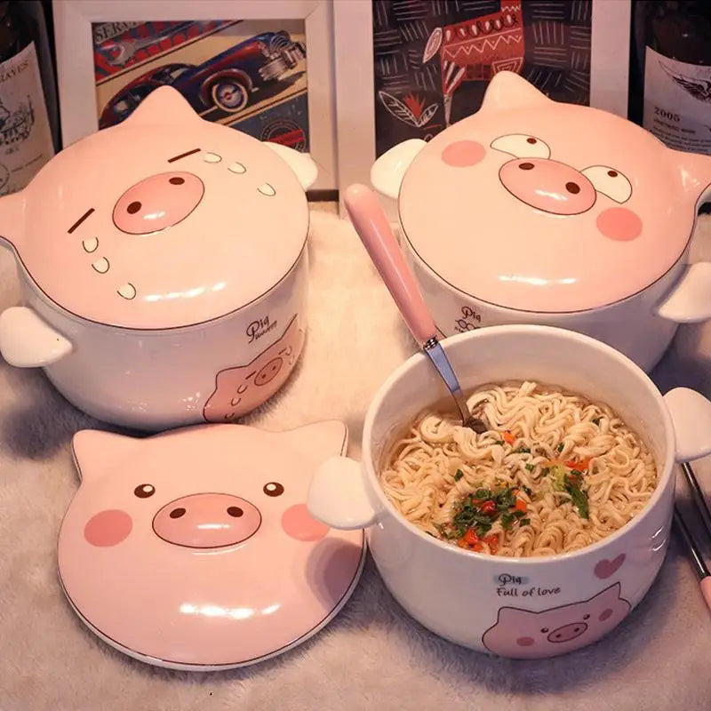 Four pig themed kawaii ramen bowl on a table