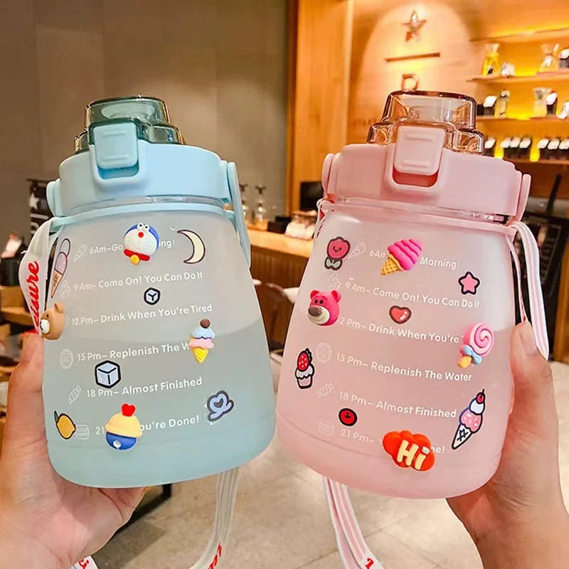Two colorful kawaii water bottles with motivational stickers held in hands, indoor setting.
