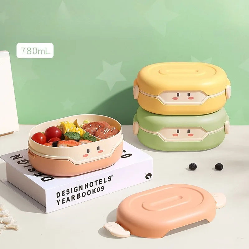 Two cartoon-style kawaii food containers on a light surface with a green background