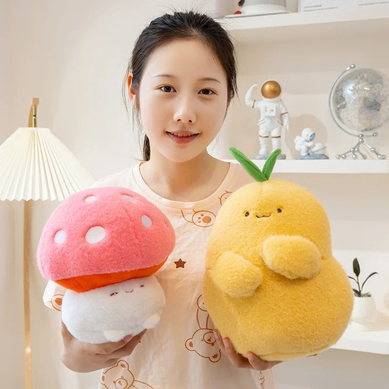 Person holding a pink mushroom kawaii plush toy and a yellow duck plush toy in a room with decorative items.
