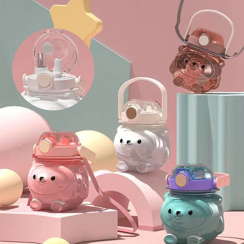 Pastel-colored children's kawaii water bottles with cute designs on a colorful background