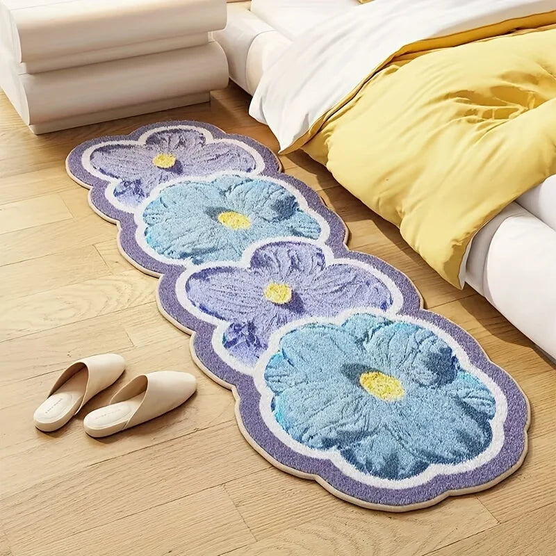 Floral patterned kawaii rug on a wooden floor with yellow bedding and white shoes.