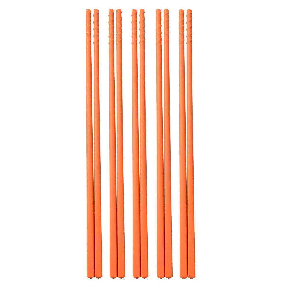 Set of orange kawaii chopsticks on a white background