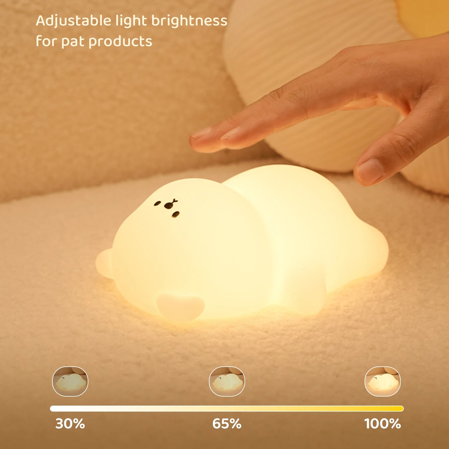 Adjustable light brightness indicator for a kawaii night light on a soft surface.