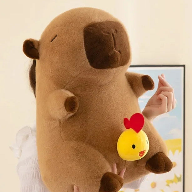 Kawaii plush toy resembling a dog with a small yellow creature on a beige background