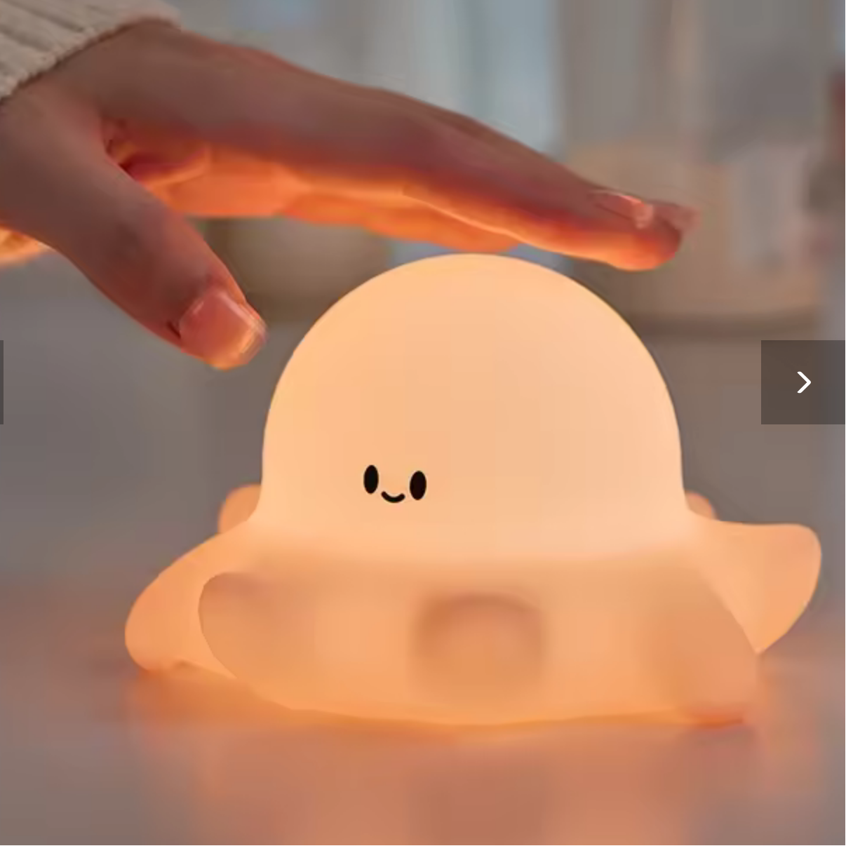 Woman pressing on a kawaii octopus night light