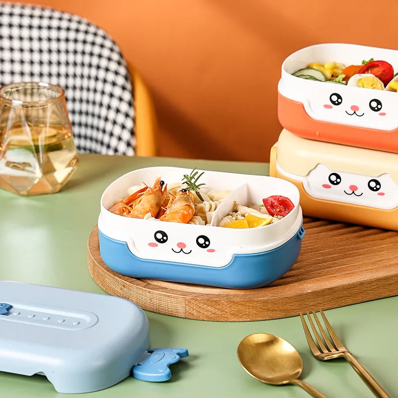 Two cartoon-style kawaii bento boxes with food on a table with a glass of water and utensils.