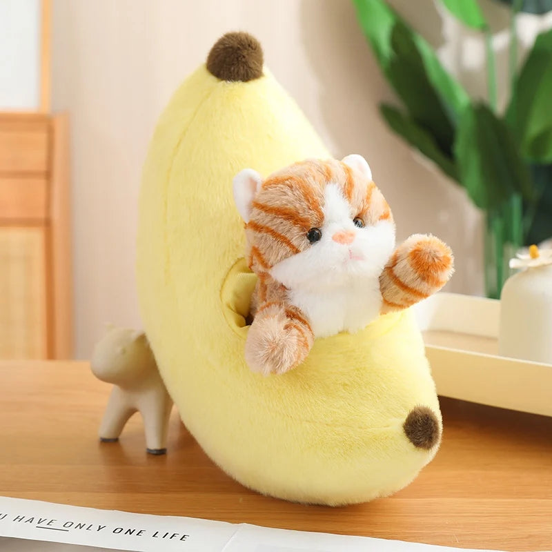 Kawaii plush toy of a cat inside a banana on a wooden surface with a plant in the background