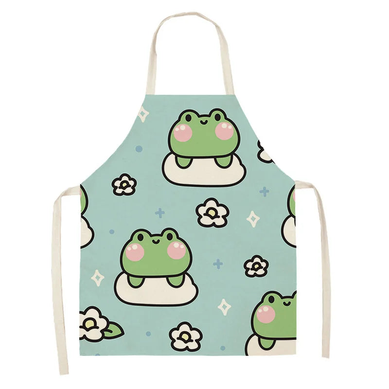 Children's kawaii apron with frog design on a light blue background