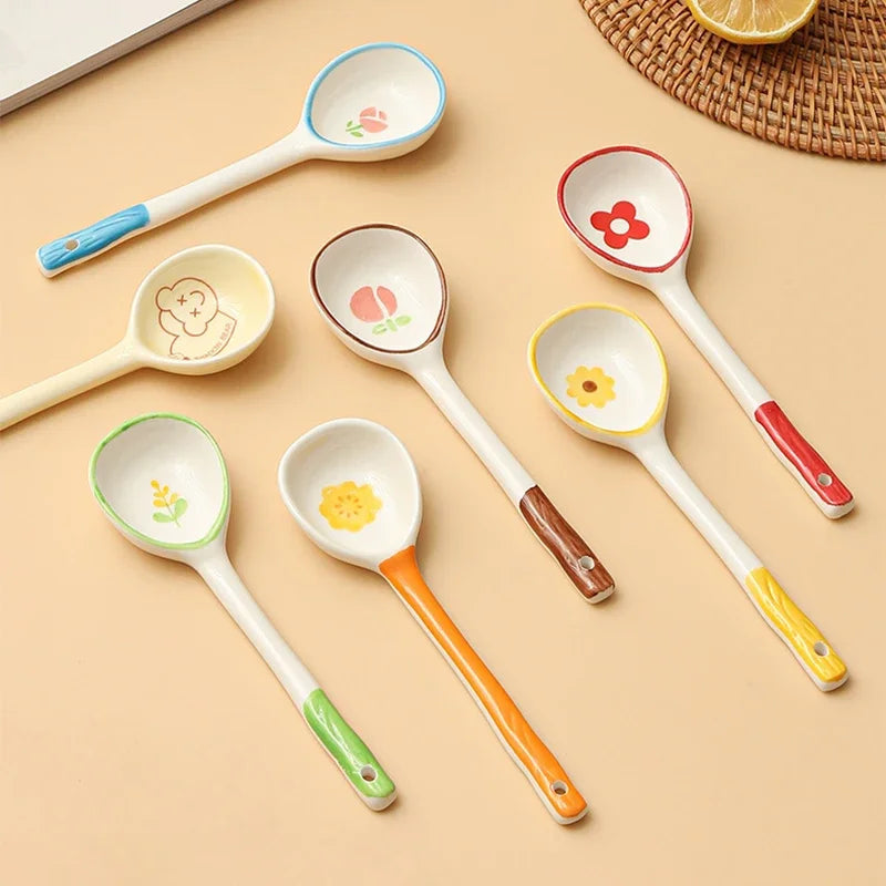 A group of multicolored kawaii spoons on a table
