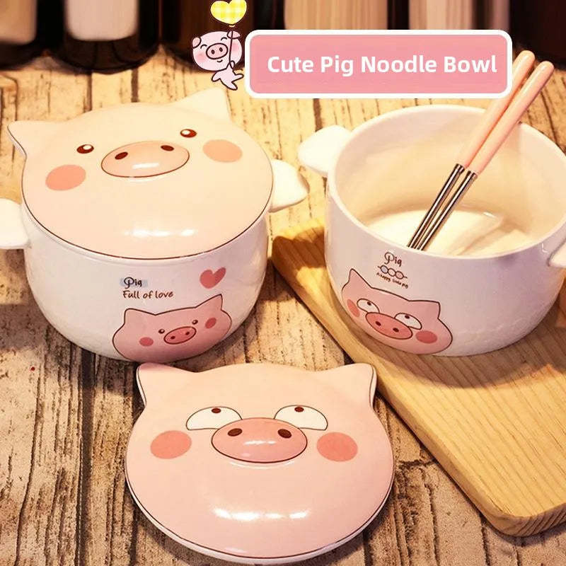 Two pig shaped large kawaii ramen bowls on a table