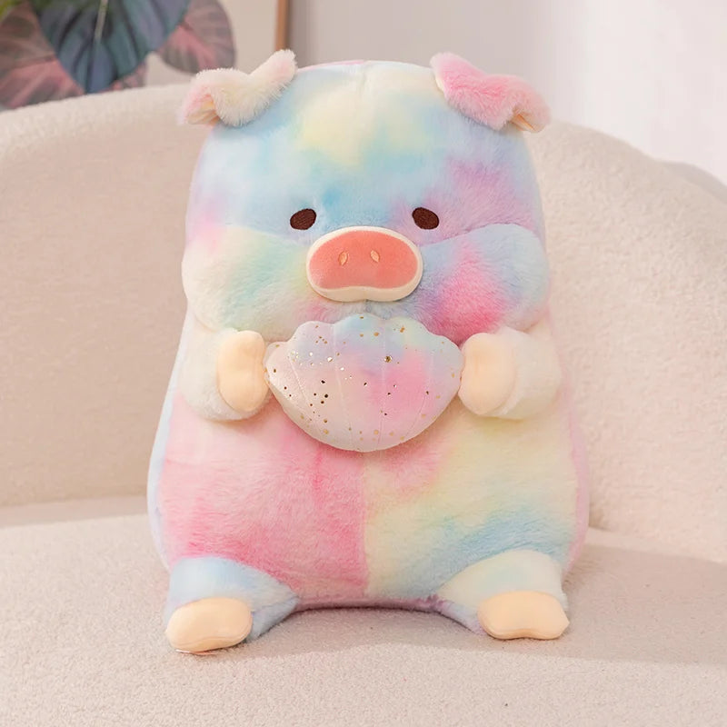 A rainbow kawaii pig plush toy sitting on a chair