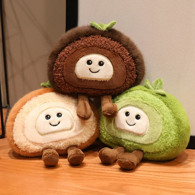Three kawaii plush toys resembling brown, beige, and green fruits on a wooden surface.