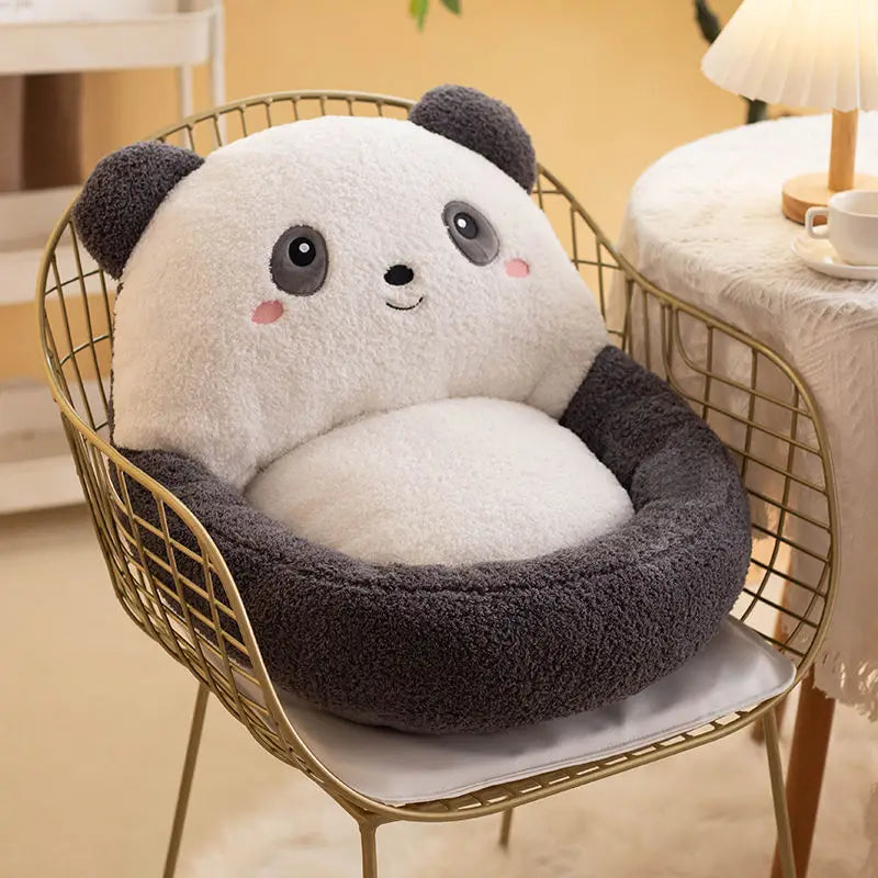 Cute panda-shaped kawaii cushion on a chair with a blurred background