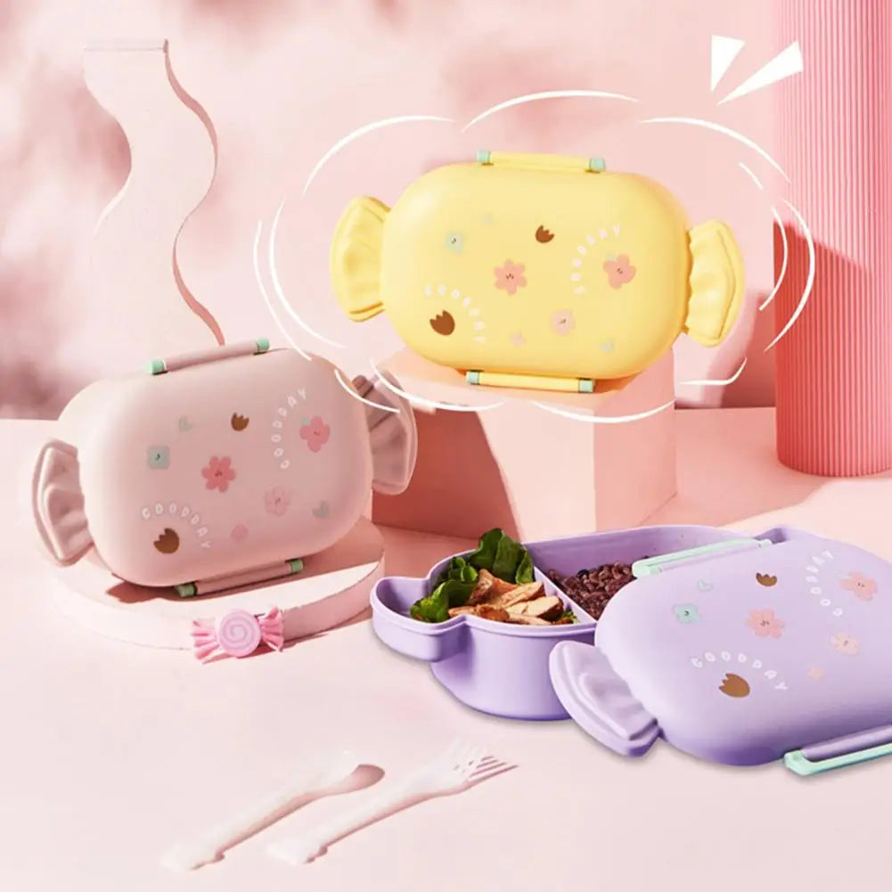 Children's kawaii lunch box set with pink and purple containers on a pink background