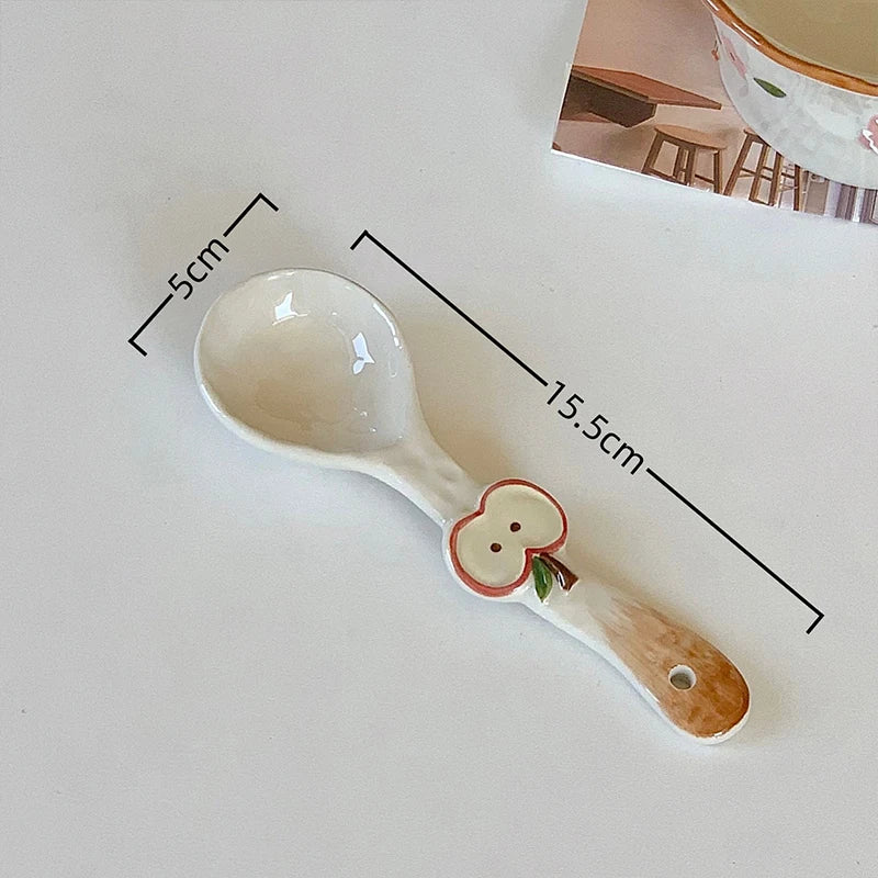 A white ceramic kawaii spoon on a table