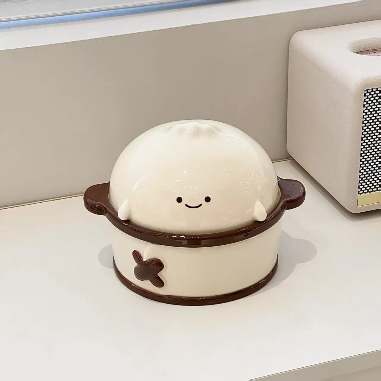 Cute white kawaii ramen bowl with a smiling face in a brown basket on a light surface.