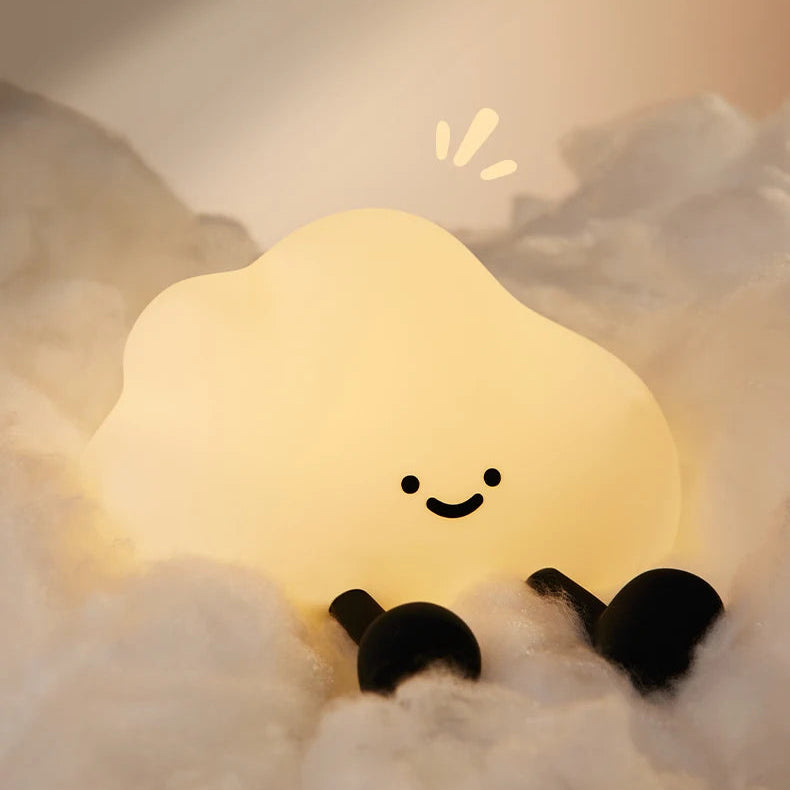 One cloud silicone kawaii night light with a smiling cloud design on a soft cloud background.