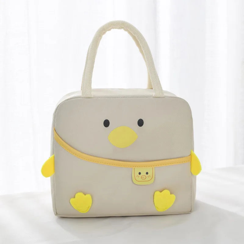 Children's kawaii lunch bag designed like a duck with yellow accents on a white background