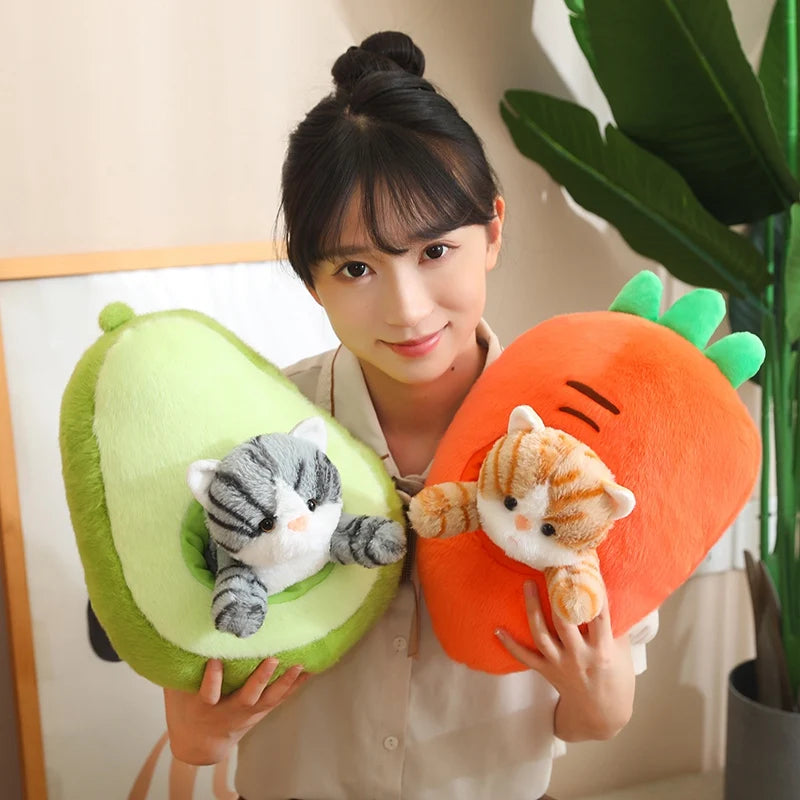 Person holding avocado and carrot-shaped kawaii plush toys with cat and dog figures inside.