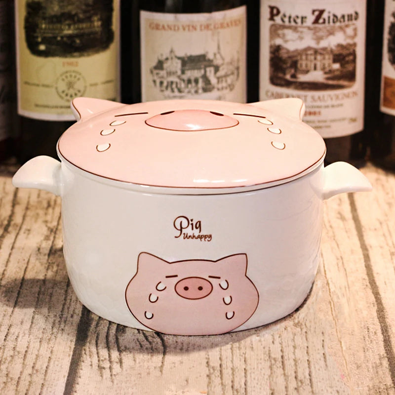 A white pig shaped large kawaii ramen bowl sitting on the table