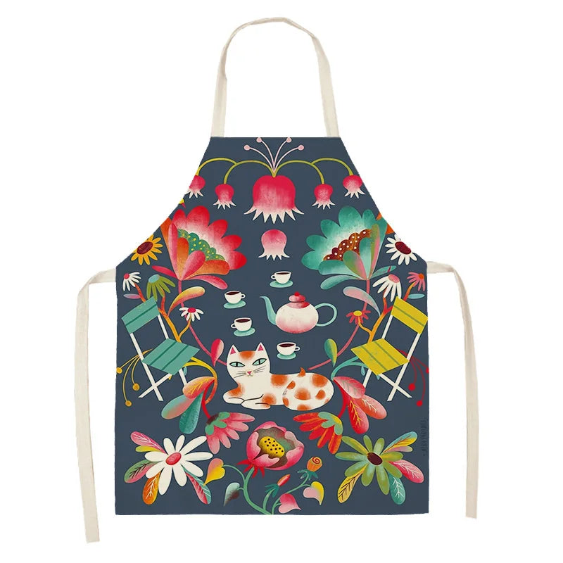 Colorful kawaii apron with floral and cat design on a white background