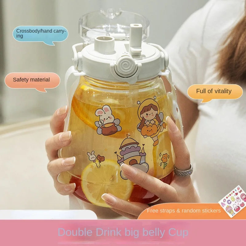 Person holding a kawaii drink cup with cartoon designs and text about safety material and vitality.
