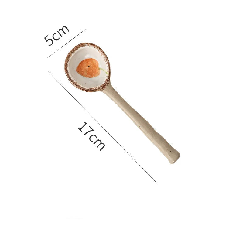 An orange designed kawaii spoon on a white background