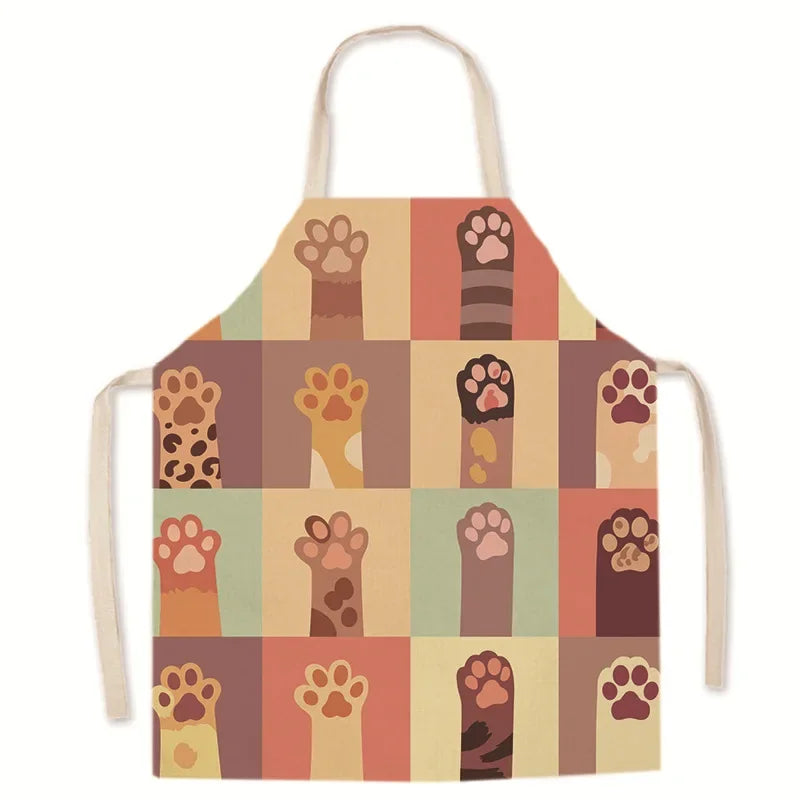 Kawaii apron with paw print pattern on a white background