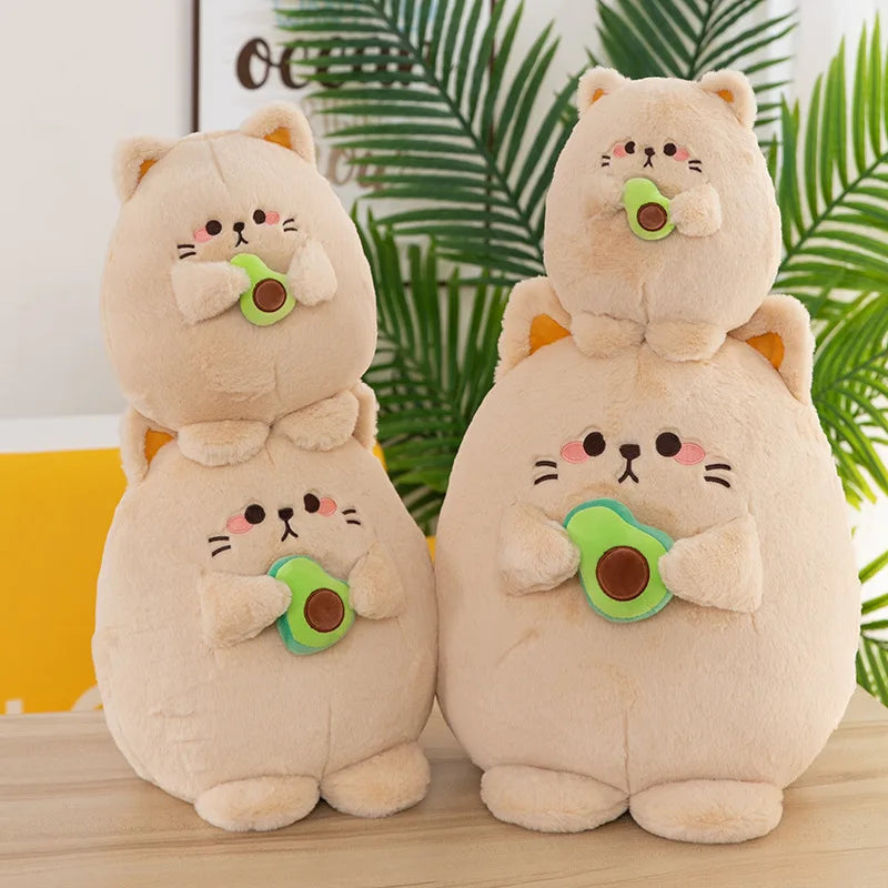 Three kawaii plush toys shaped like cats with pacifiers on a wooden surface with a leafy green background.