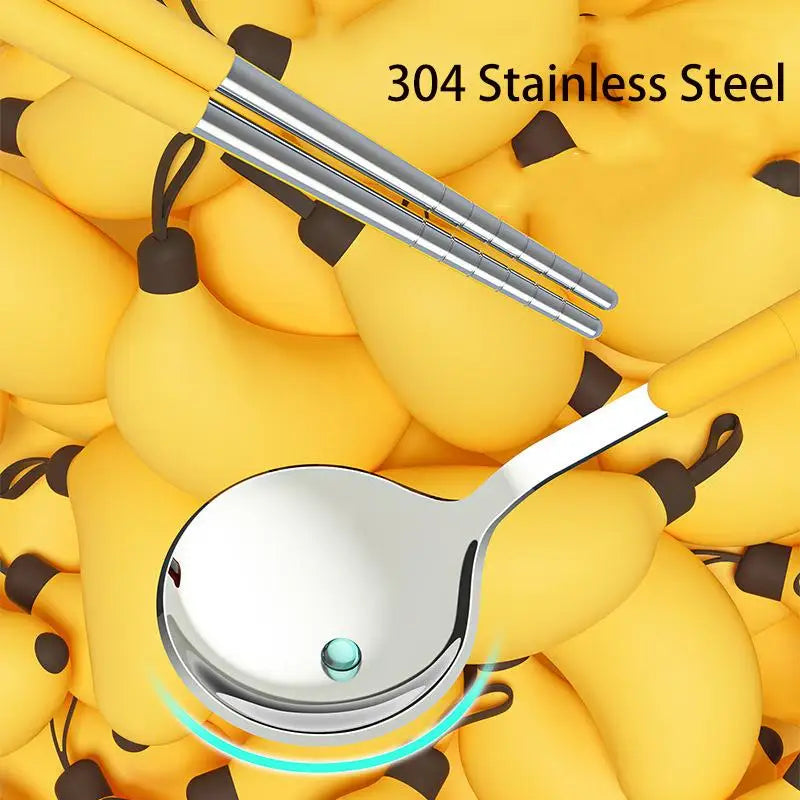 A set of steel kawaii utensils on a banana themed background