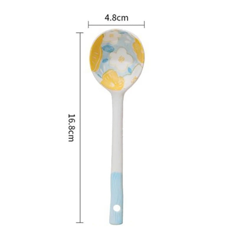 A white and blue kawaii spoon on a white background