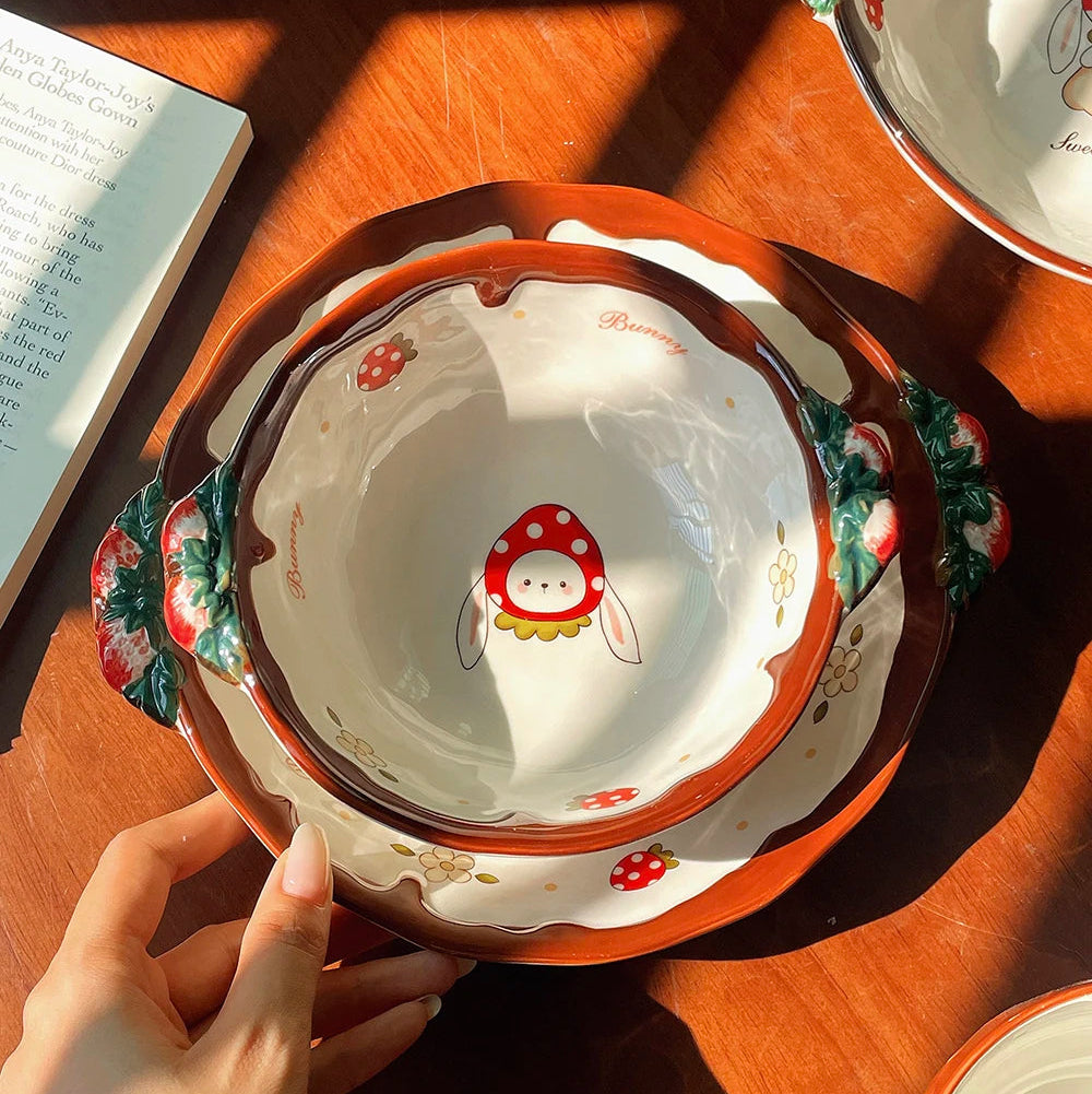 Someone holding a kawaii ramen bowl with a bunny rabbit on it