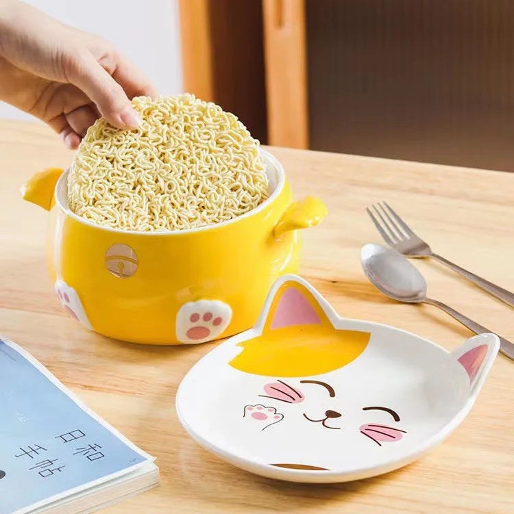 Yellow kawaii ramen bowl with cartoon design on a wooden table