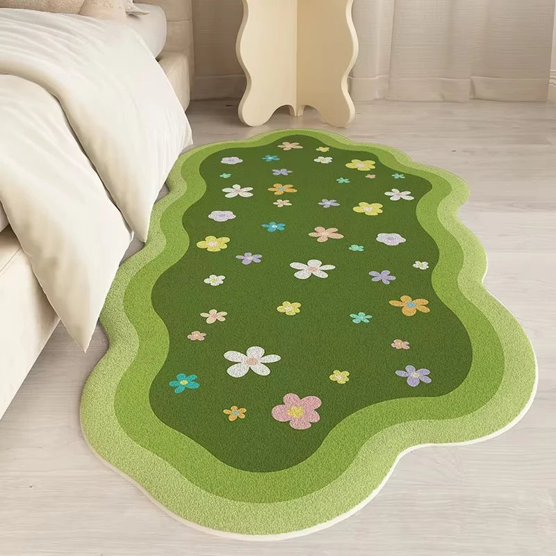 Green floral kawaii rug on a wooden floor in a room with a bed and nightstand.