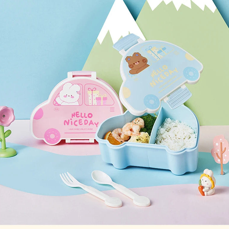 Children's kawaii bento box with pink and blue car designs, food items, and utensils on a colorful background.