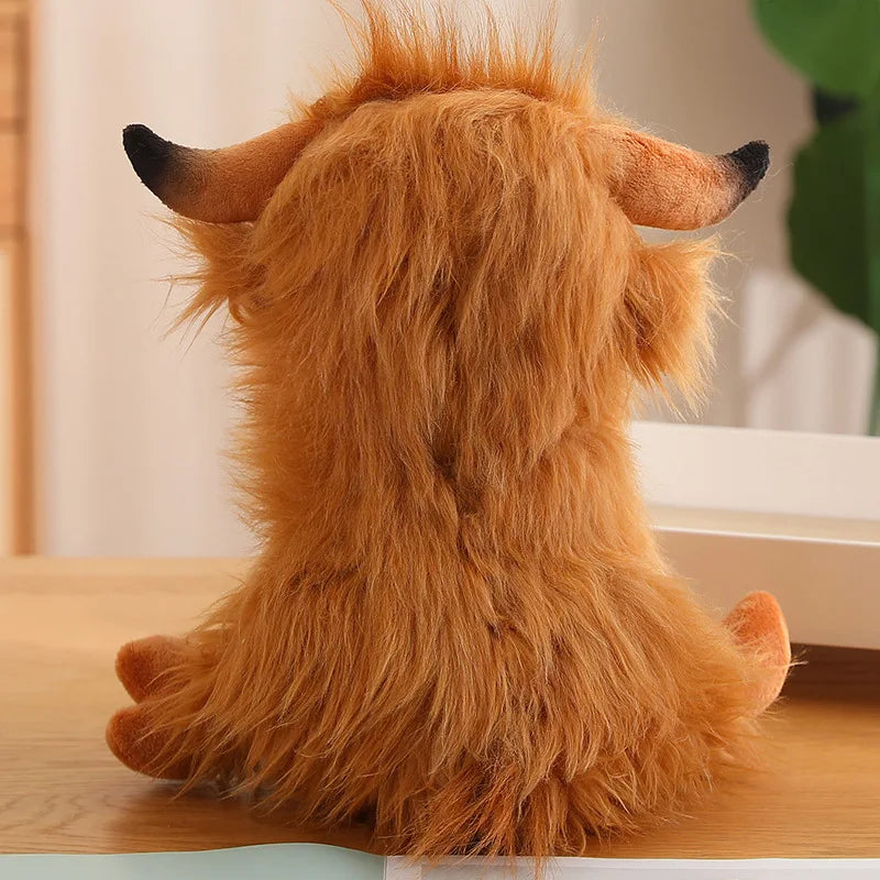 Plush kawaii toy resembling a lion on a wooden surface with a blurred background